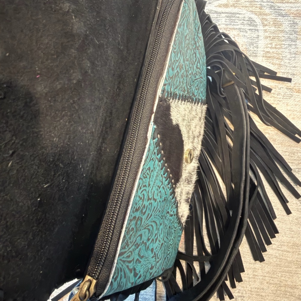 Turquoise Accent Cowhide Tooled Fringe Crossbody Bag - Picture 6 of 9